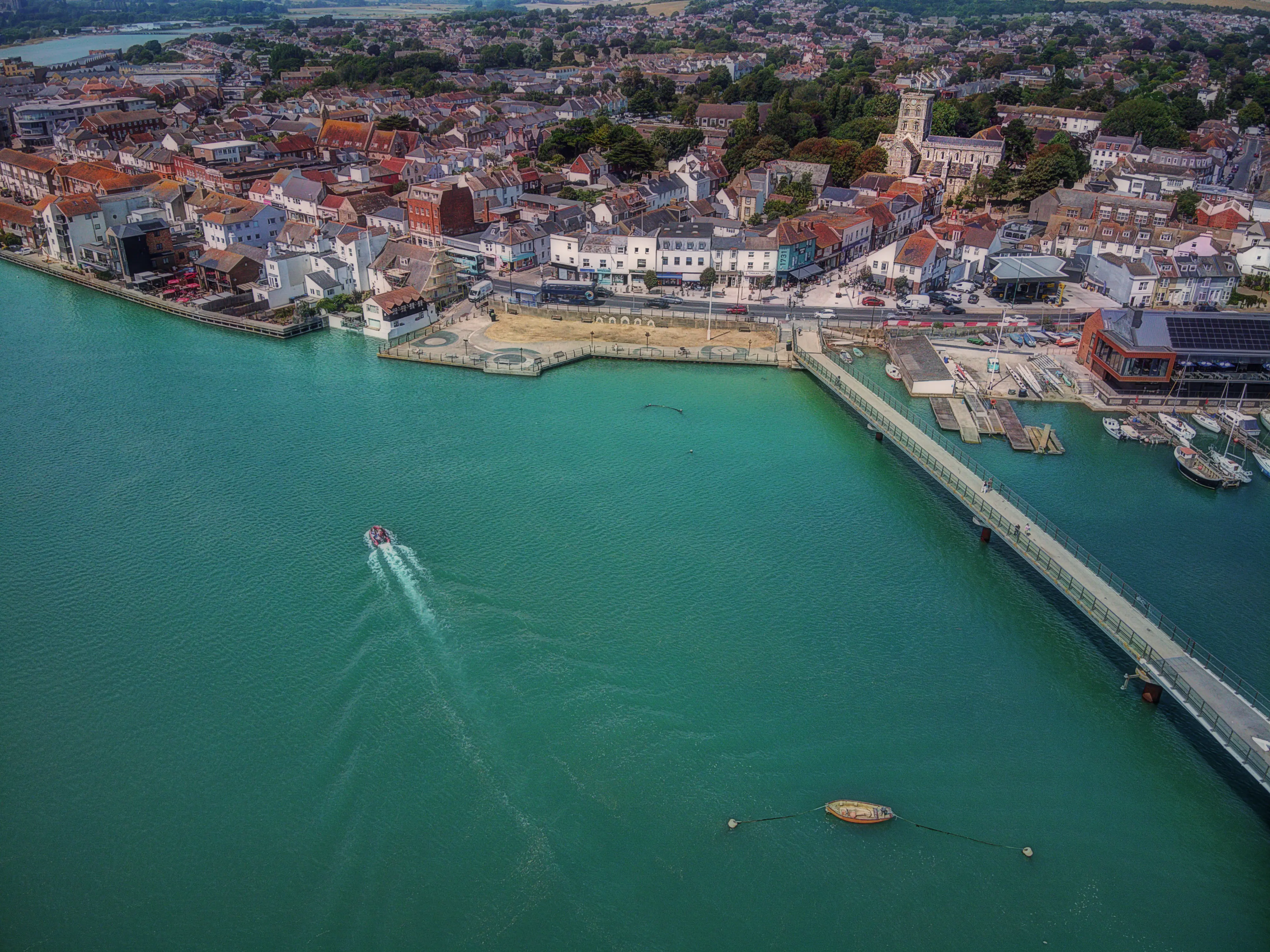 The Adur Ferry Bridge and Shoreham-by-Sea town centre from the air on a summer morning